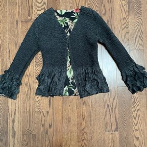 Beautiful, unique reversible blazer. Stretch bubble material. Ruffled borders.